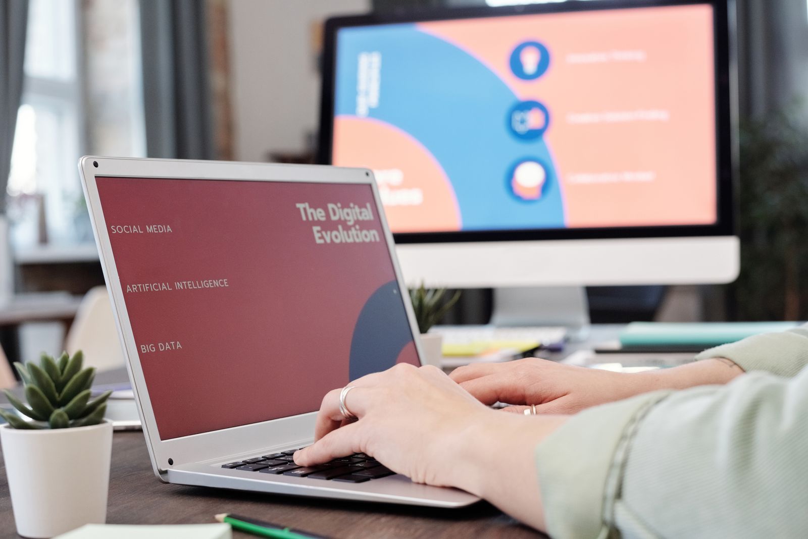 Marketer working on a laptop with AI-powered marketing workflows on screen, illustrating AI agents for marketing