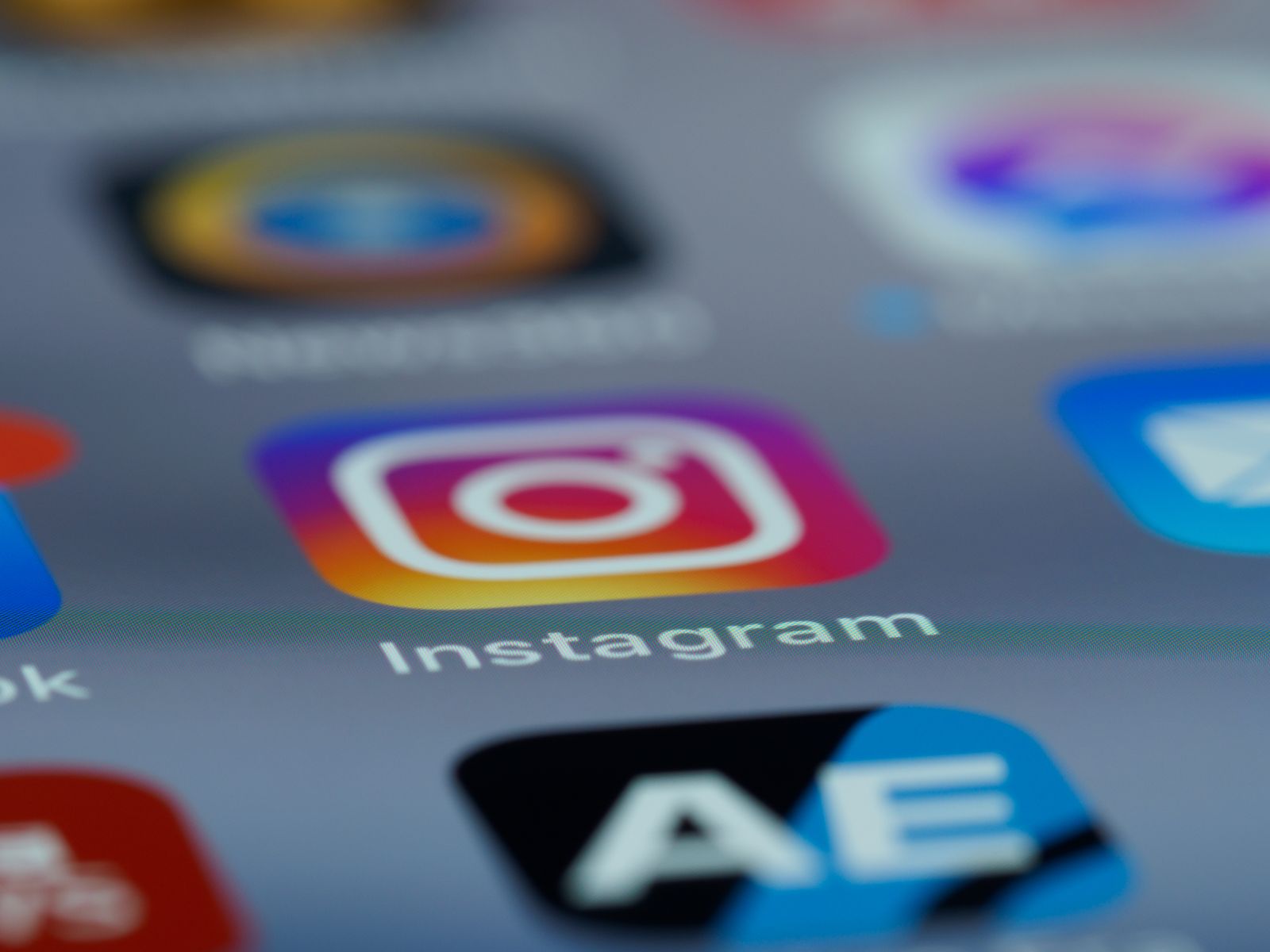 Smartphone displaying the Instagram app, where ManyChat Instagram DM automation sends automated direct messages