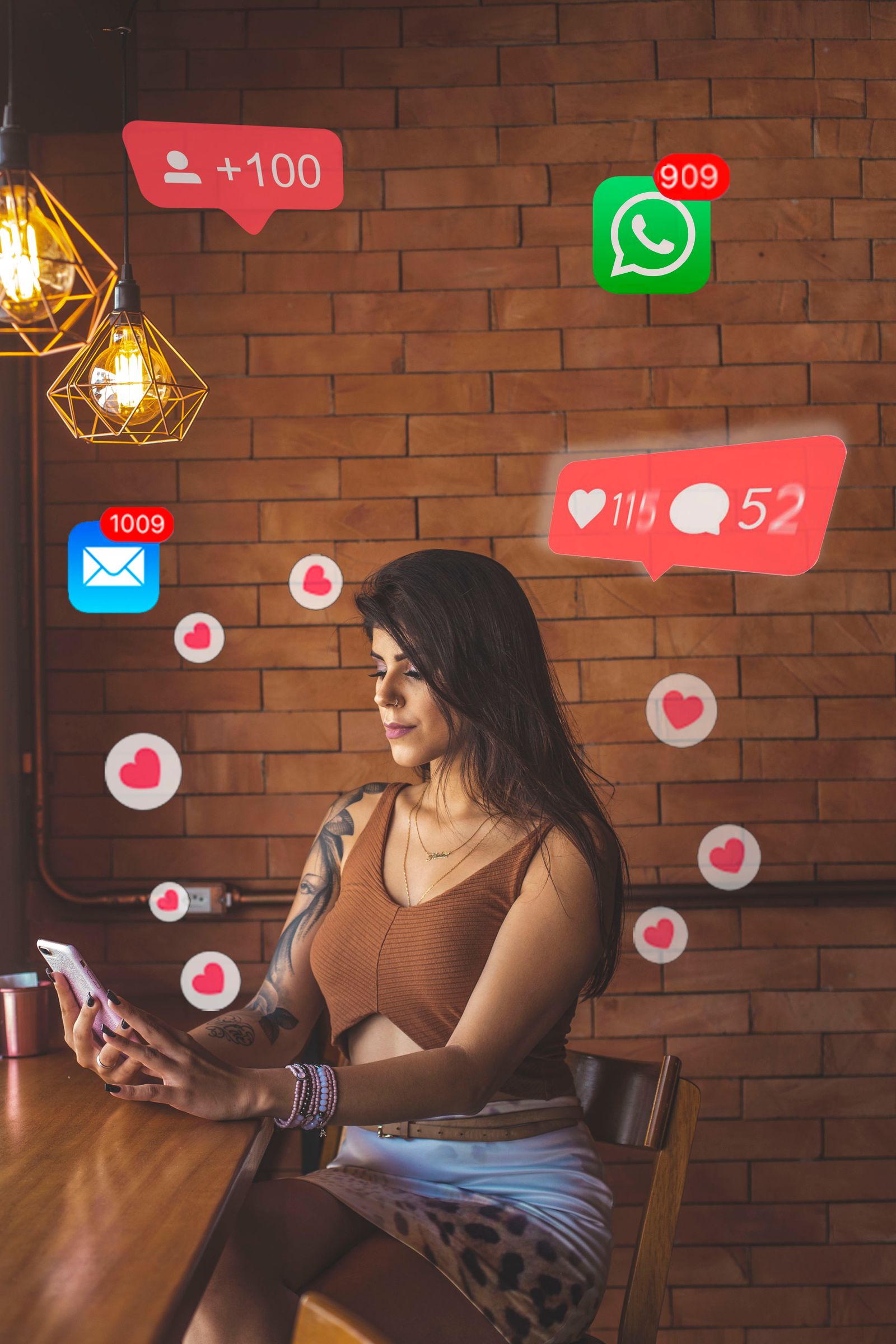 Woman in a cafe replying to social media comments and notifications on her phone, illustrating community management in social media